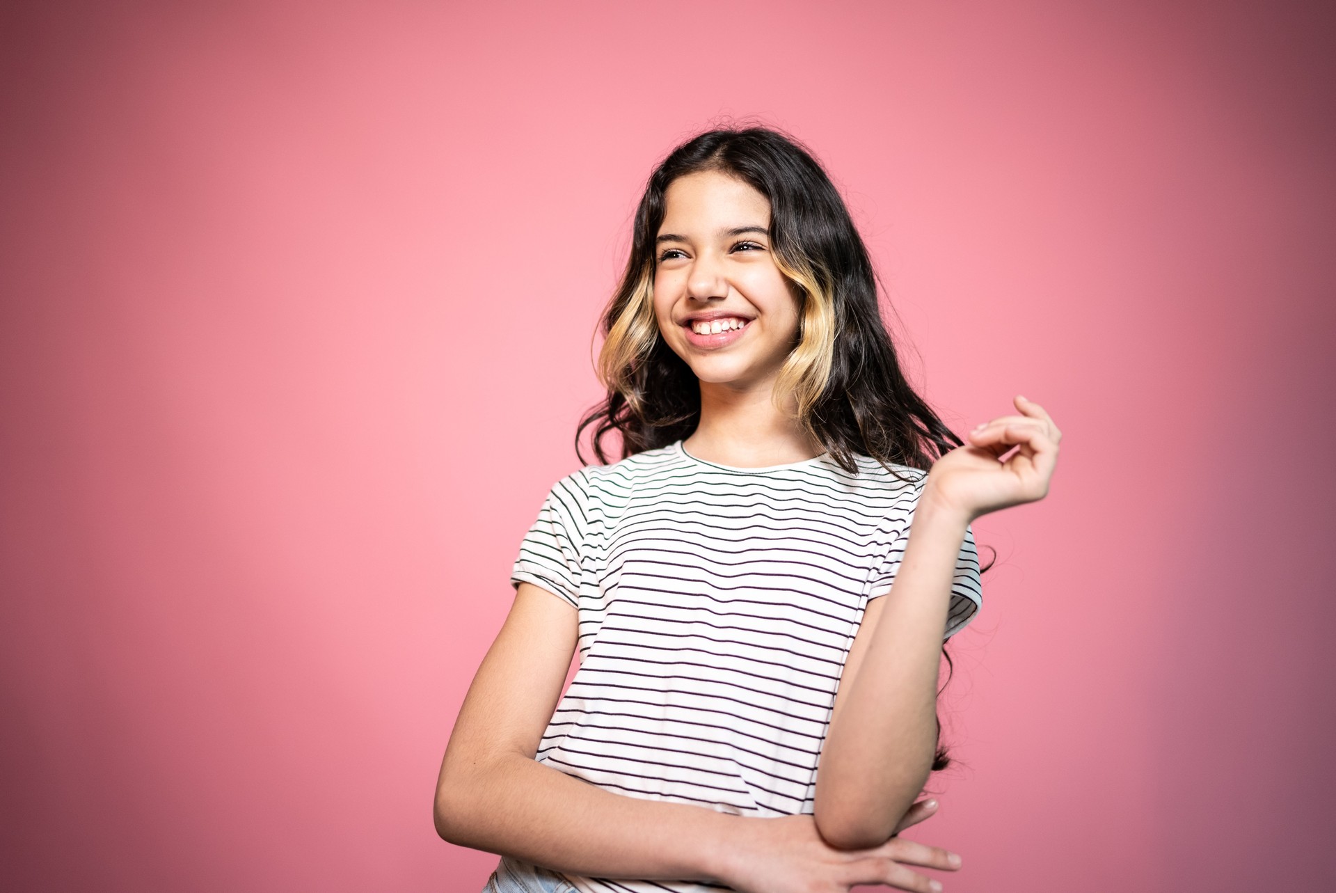 Teenager smiling while looking away